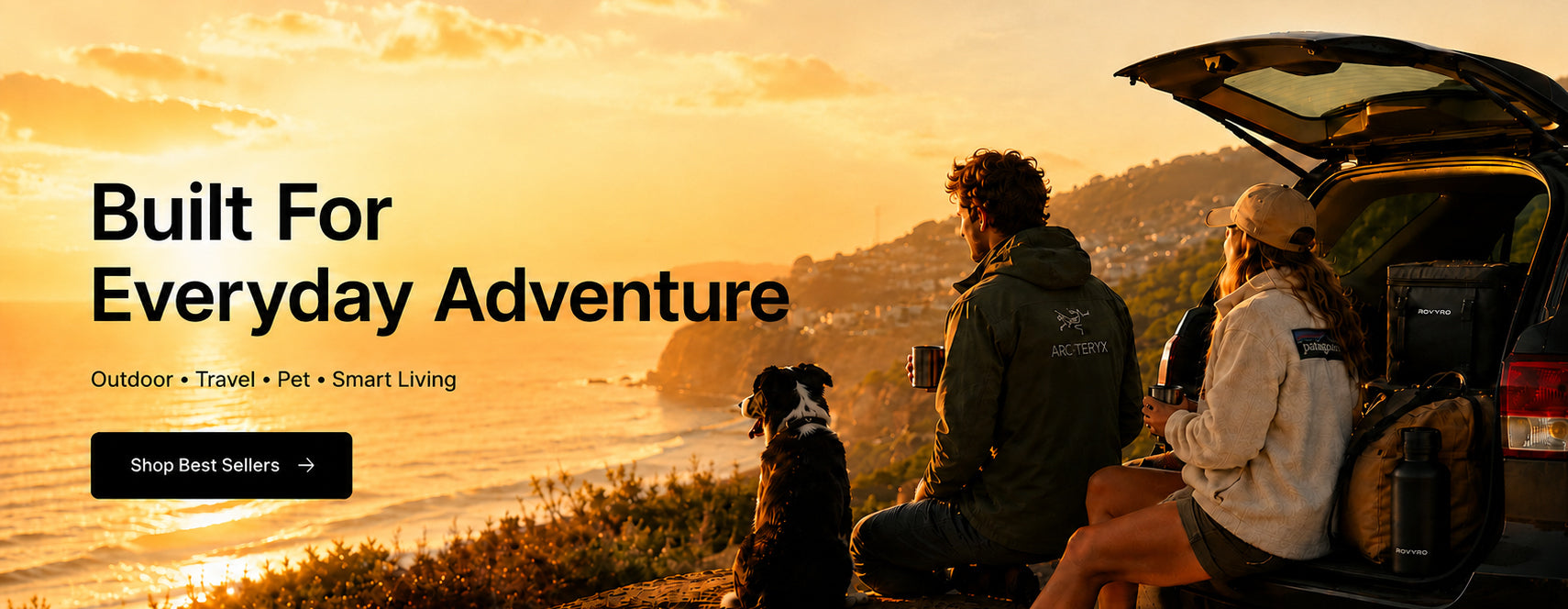 Couple enjoying an outdoor sunset adventure beside an SUV overlooking the Australian coastline