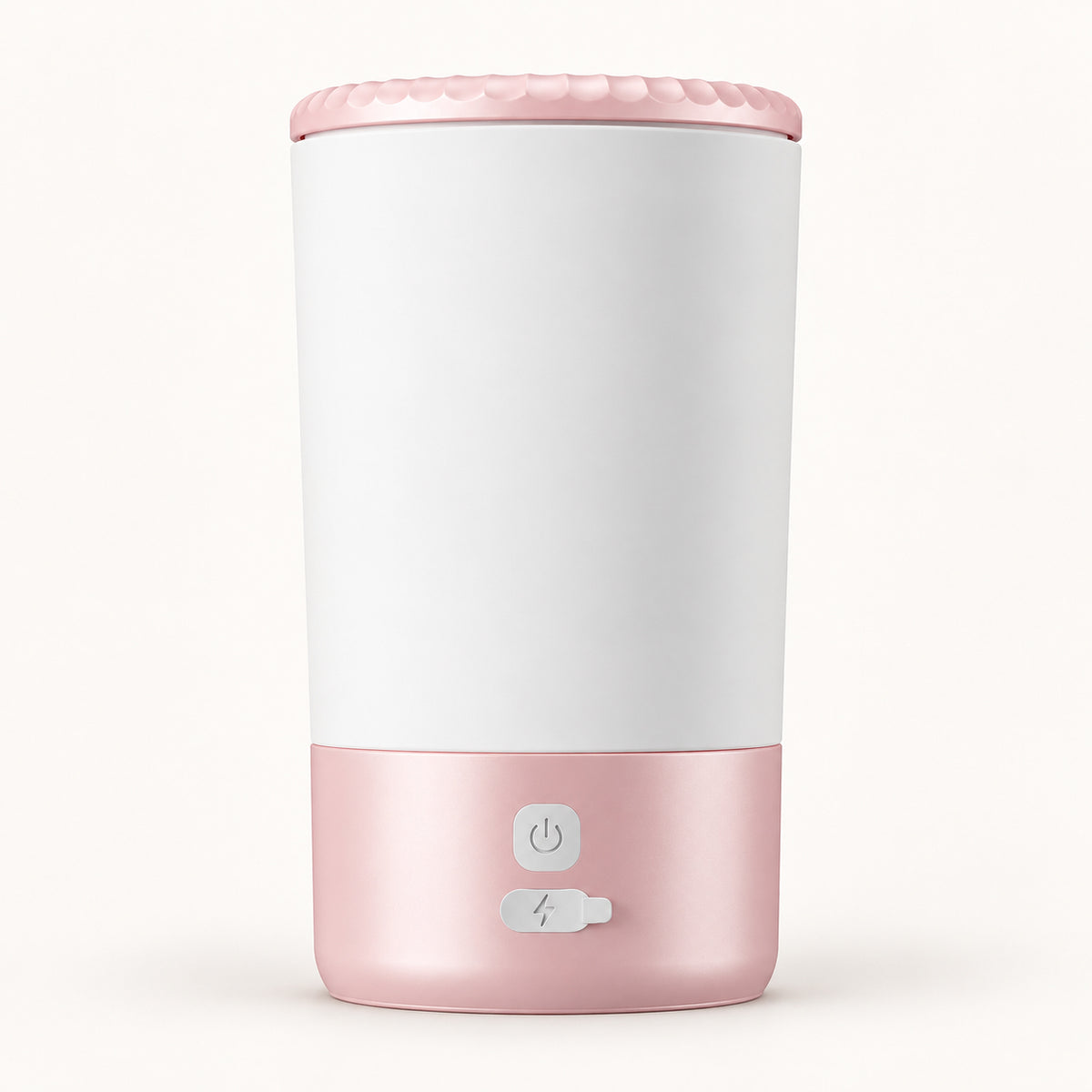 Electric Dog Paw Cleaner in Pink & White with button control, shown from the front.
