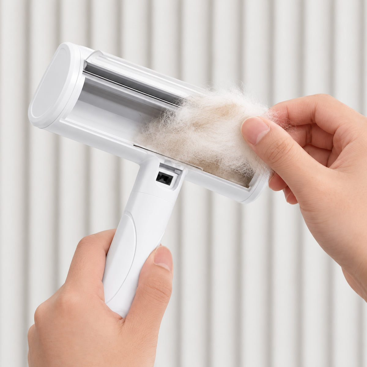 Removing collected pet hair from a reusable pet hair remover brush