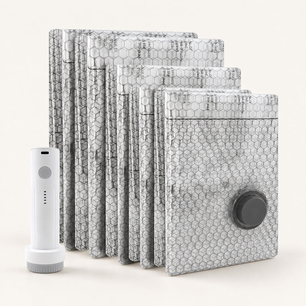 Travel Vacuum Bag Set with six grey patterned vacuum storage bags and a white rechargeable electric pump.
