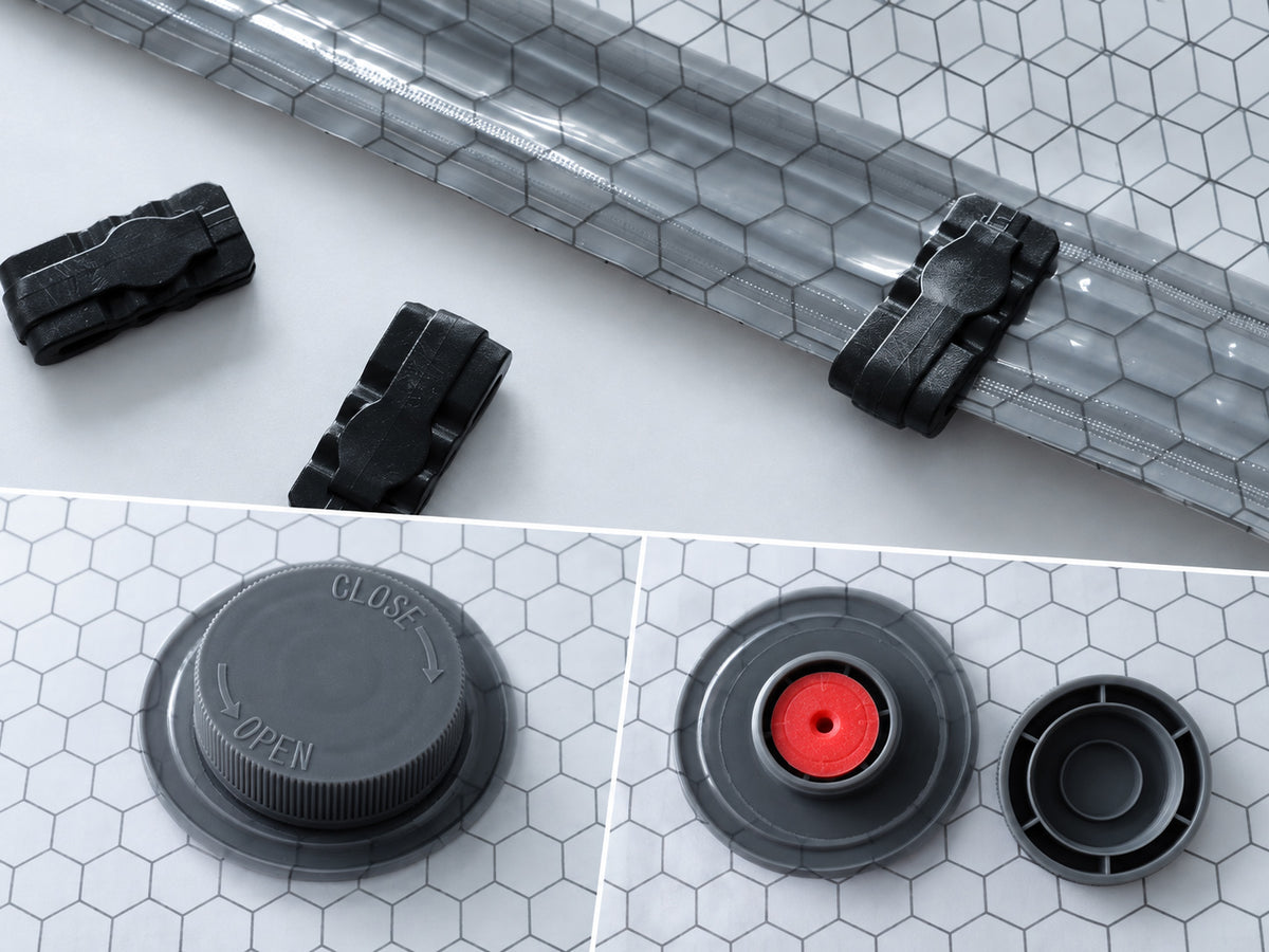 Travel Vacuum Bag Set with Pump showing the double-zip seal, sealing sliders, closed valve cap and internal red rubber stopper.